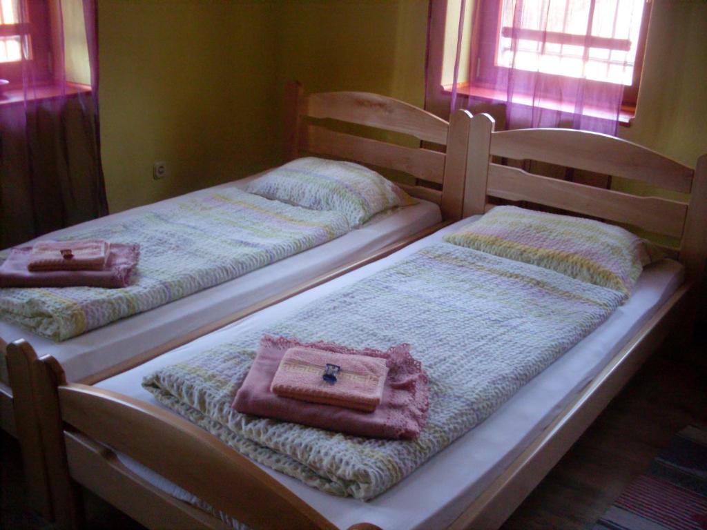 Postel nebo postele na pokoji v ubytování Apartments Vratnik