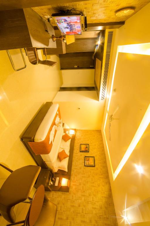 TV a/nebo společenská místnost v ubytování Hotel Indraprasttha