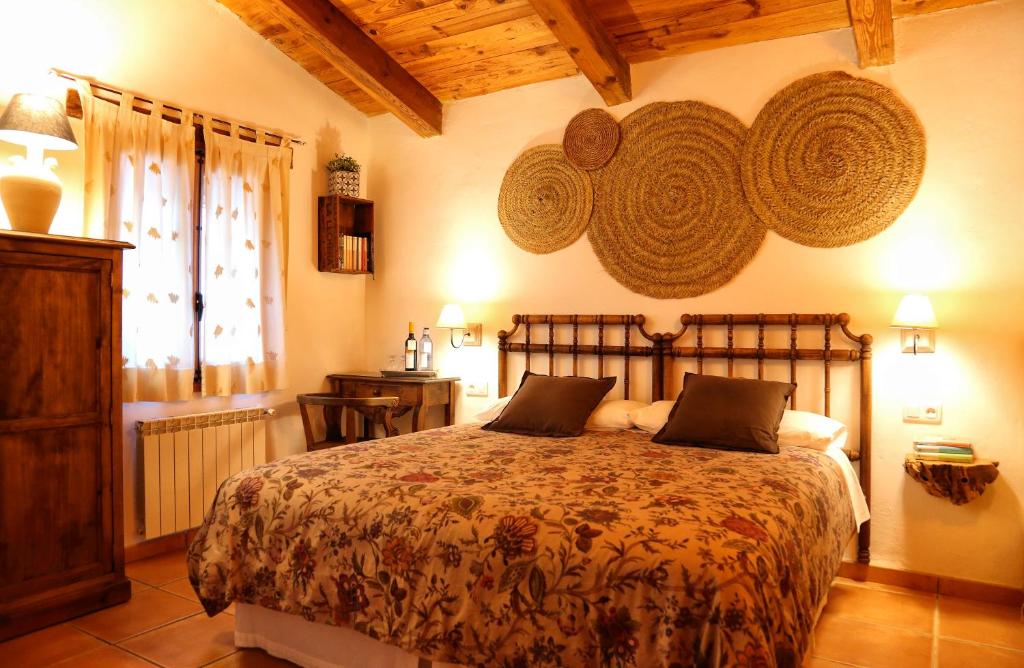 Postel nebo postele na pokoji v ubytování Cortijo De Ramón