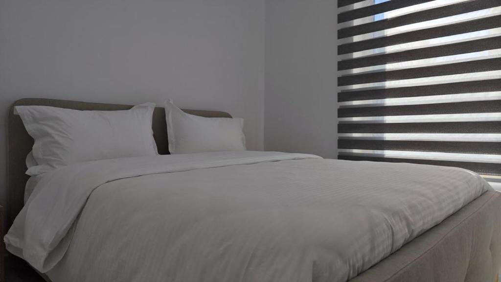 Postel nebo postele na pokoji v ubytování Villa Manuel