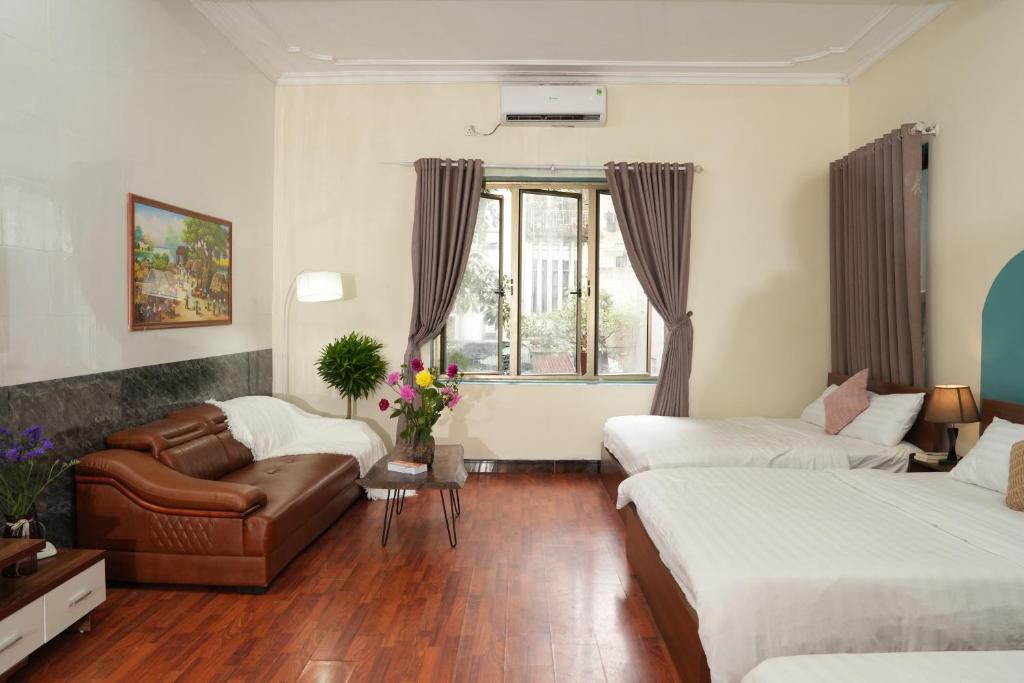 Postel nebo postele na pokoji v ubytování Hanoi Crocus Homestay