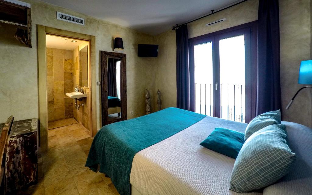 Postel nebo postele na pokoji v ubytování Room Tarifa
