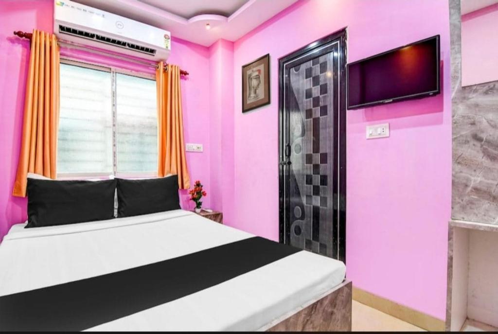 Postel nebo postele na pokoji v ubytování HOTEL-AL BURj INTERNATIONAL