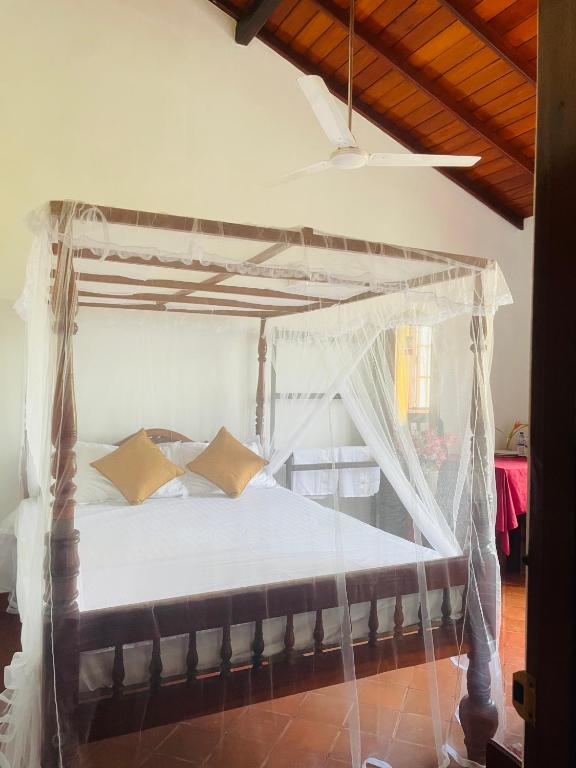 Postel nebo postele na pokoji v ubytování Island House