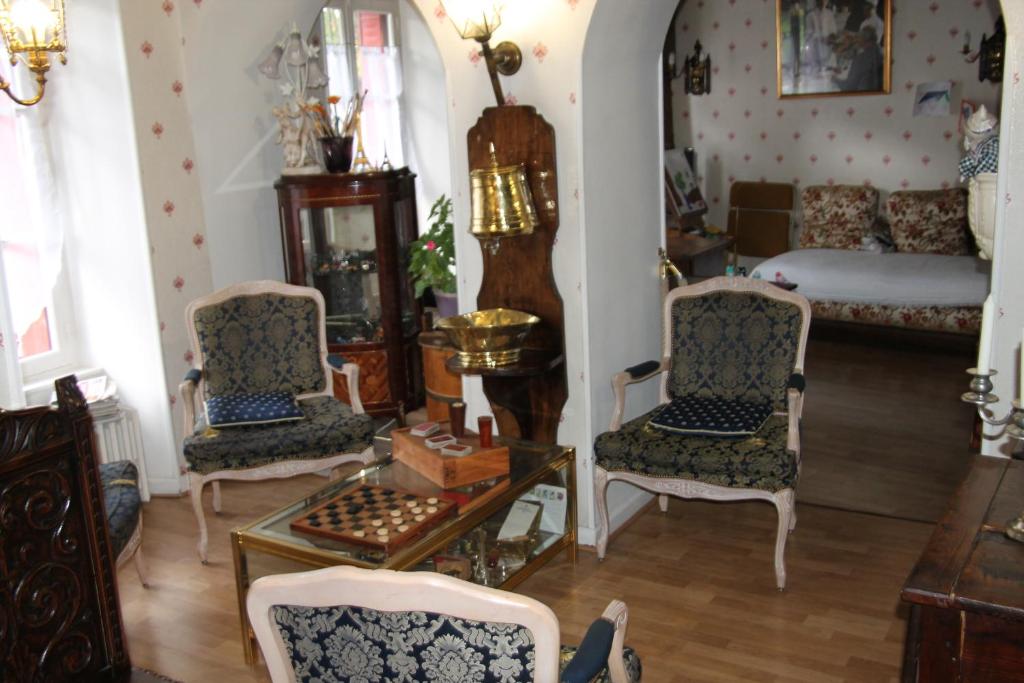 Posezení v ubytování Hostellerie du Beffroy