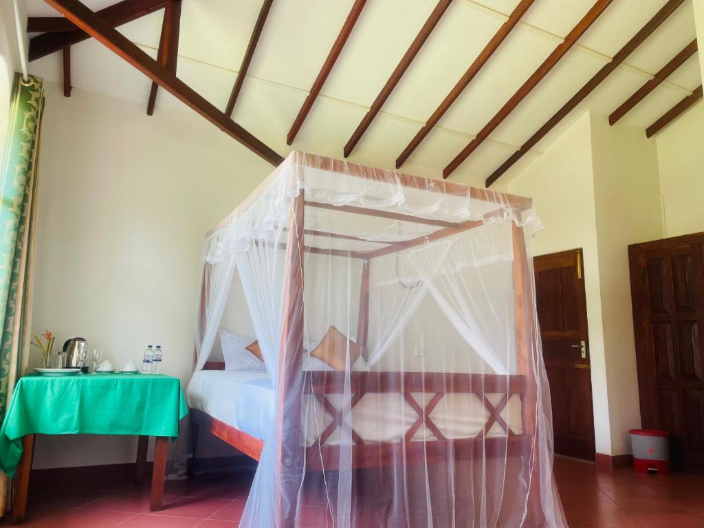 Postel nebo postele na pokoji v ubytování Island House