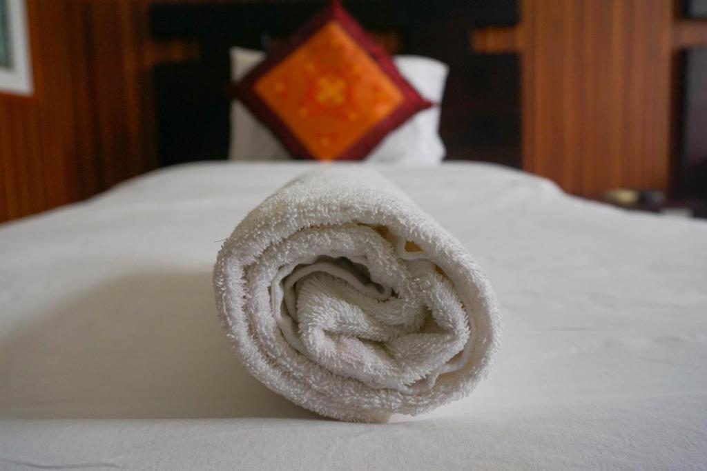 Postel nebo postele na pokoji v ubytování Paradise Hotel Hoi An