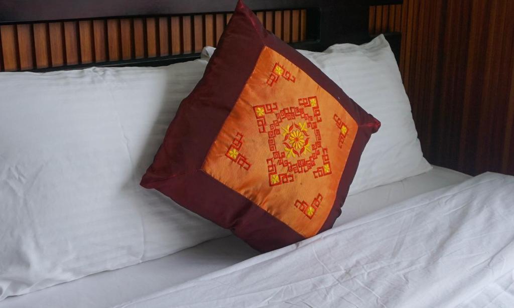 Postel nebo postele na pokoji v ubytování Paradise Hotel Hoi An