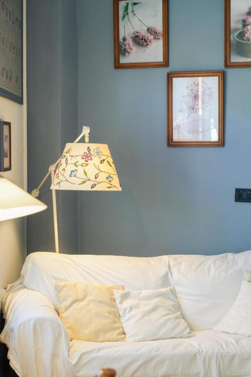 Postel nebo postele na pokoji v ubytování La Curandera