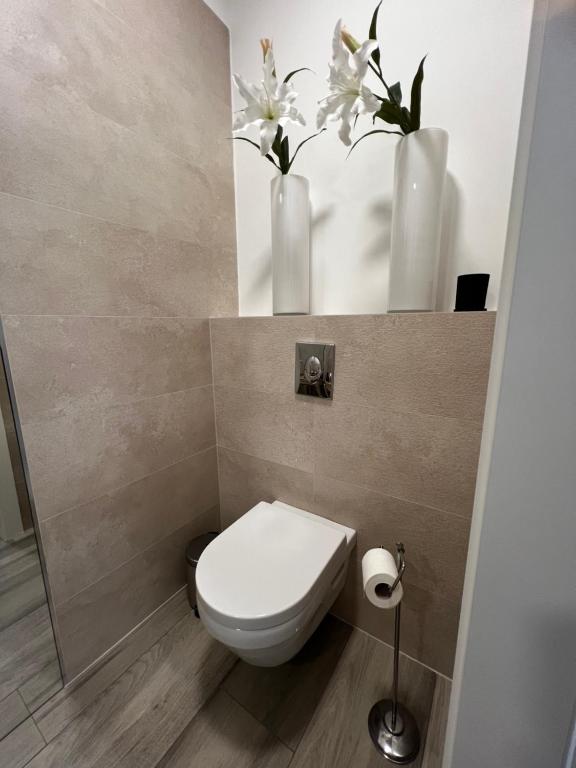 Ein Badezimmer in der Unterkunft LuxArt City Spa Gallery Residence Krk
