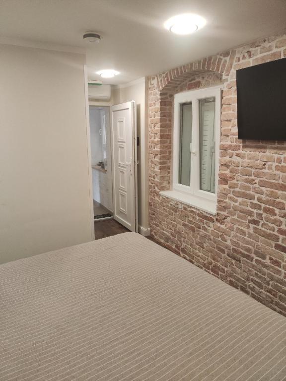 TV a/nebo společenská místnost v ubytování Luxury and Authentic Studio in Split Old Town