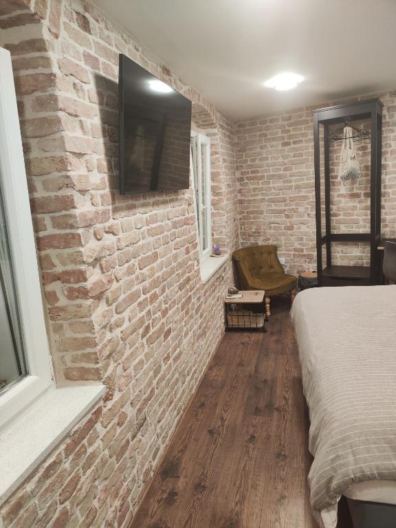 Postel nebo postele na pokoji v ubytování Luxury and Authentic Studio in Split Old Town