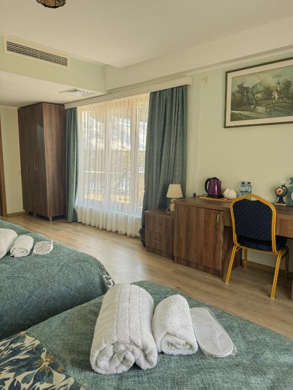 Postel nebo postele na pokoji v ubytování Lileo Kutaisi - Hotel&Winery