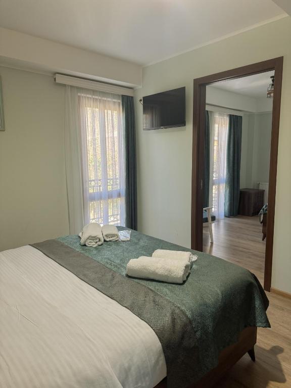 Postel nebo postele na pokoji v ubytování Lileo Kutaisi - Hotel&Winery