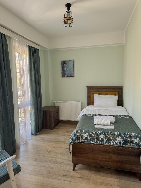 Postel nebo postele na pokoji v ubytování Lileo Kutaisi - Hotel&Winery