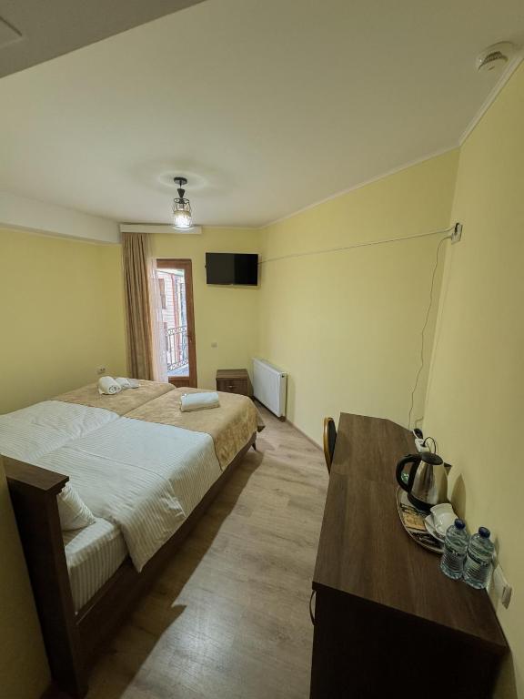 Postel nebo postele na pokoji v ubytování Lileo Kutaisi - Hotel&Winery