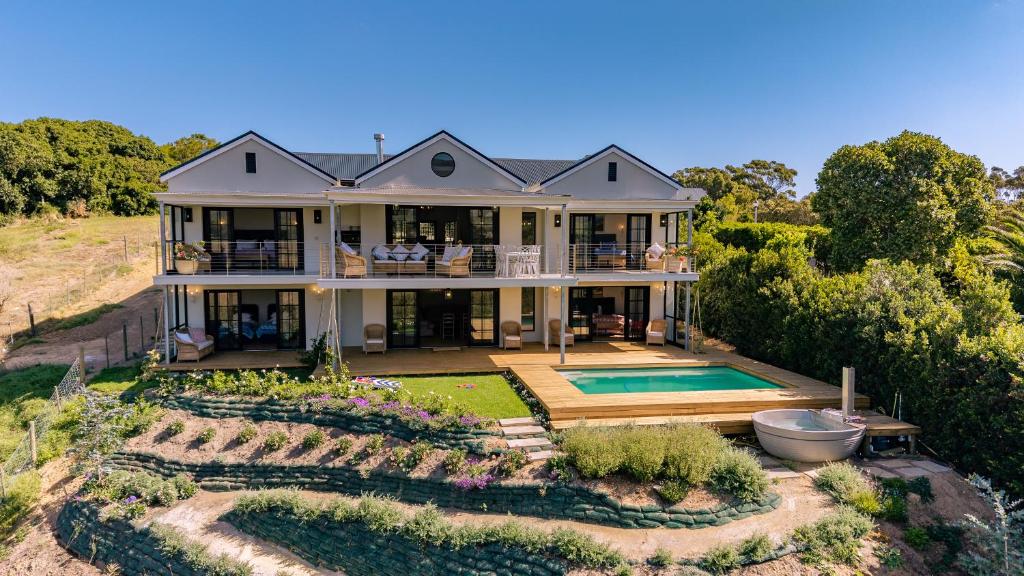 an aerial view of a house with a garden at Klein River Cottage, Stanford Getaway in Stanford