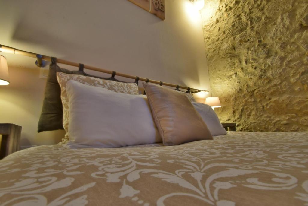 Postel nebo postele na pokoji v ubytování Chambre d'hôtes L'altitude - Domaine la Rose des vents