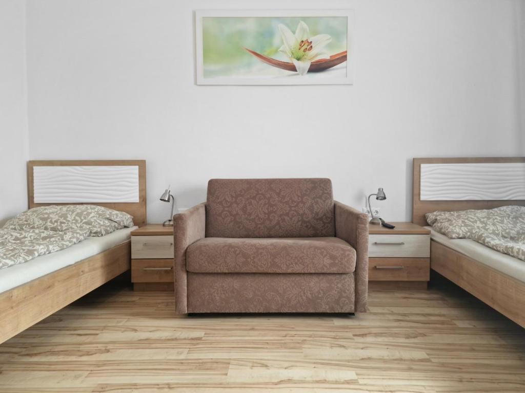 Postel nebo postele na pokoji v ubytování CityApt Wolfik Stockerau
