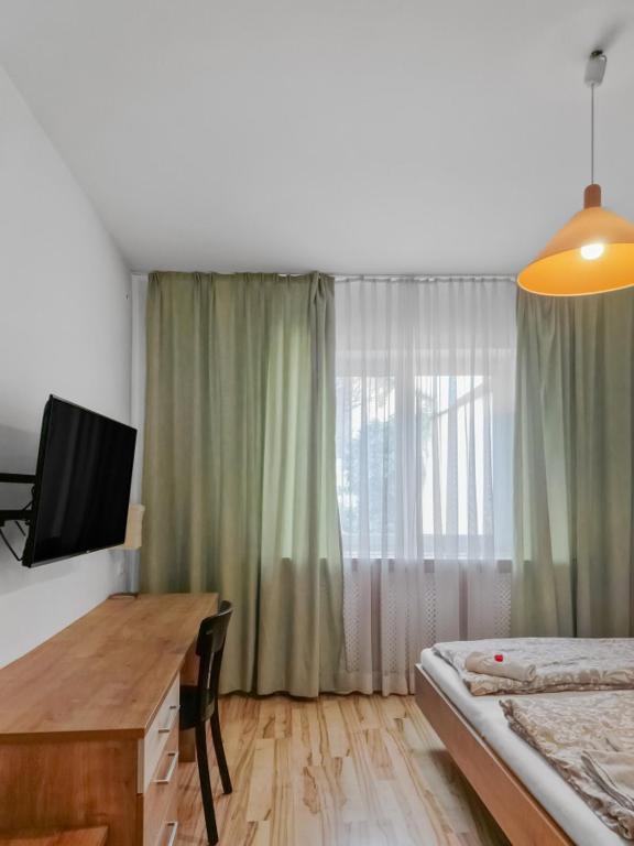 Postel nebo postele na pokoji v ubytování CityApt Wolfik Stockerau