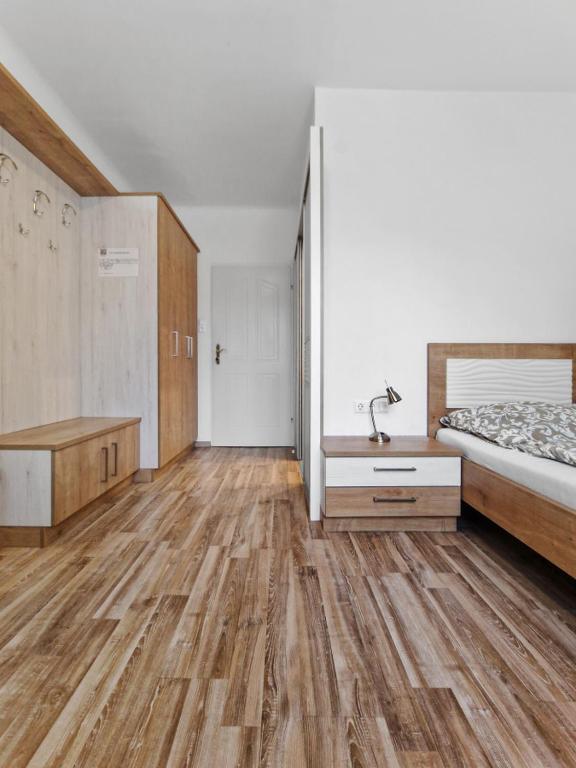 Postel nebo postele na pokoji v ubytování CityApt Wolfik Stockerau