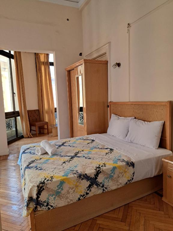 Postel nebo postele na pokoji v ubytování Philo Hotel