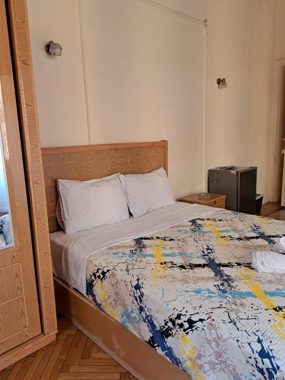 Postel nebo postele na pokoji v ubytování Philo Hotel