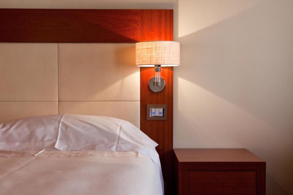Posteľ alebo postele v izbe v ubytovaní Al Tezzon Hotel