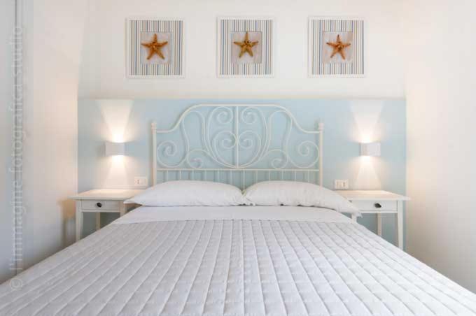 Postel nebo postele na pokoji v ubytování Le Nereidi B&B