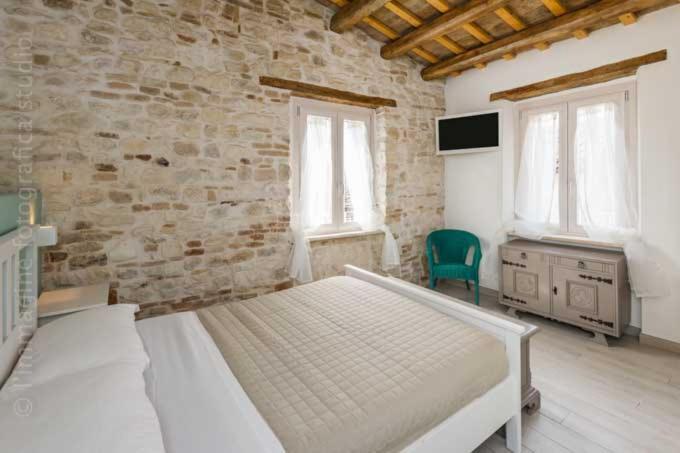 Postel nebo postele na pokoji v ubytování Le Nereidi B&B