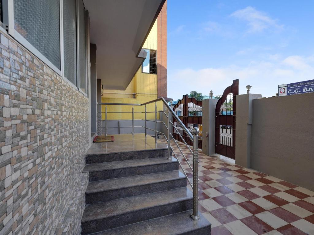 Balkón nebo terasa v ubytování Super Hotel O Vsv Guest House Maduravoyal