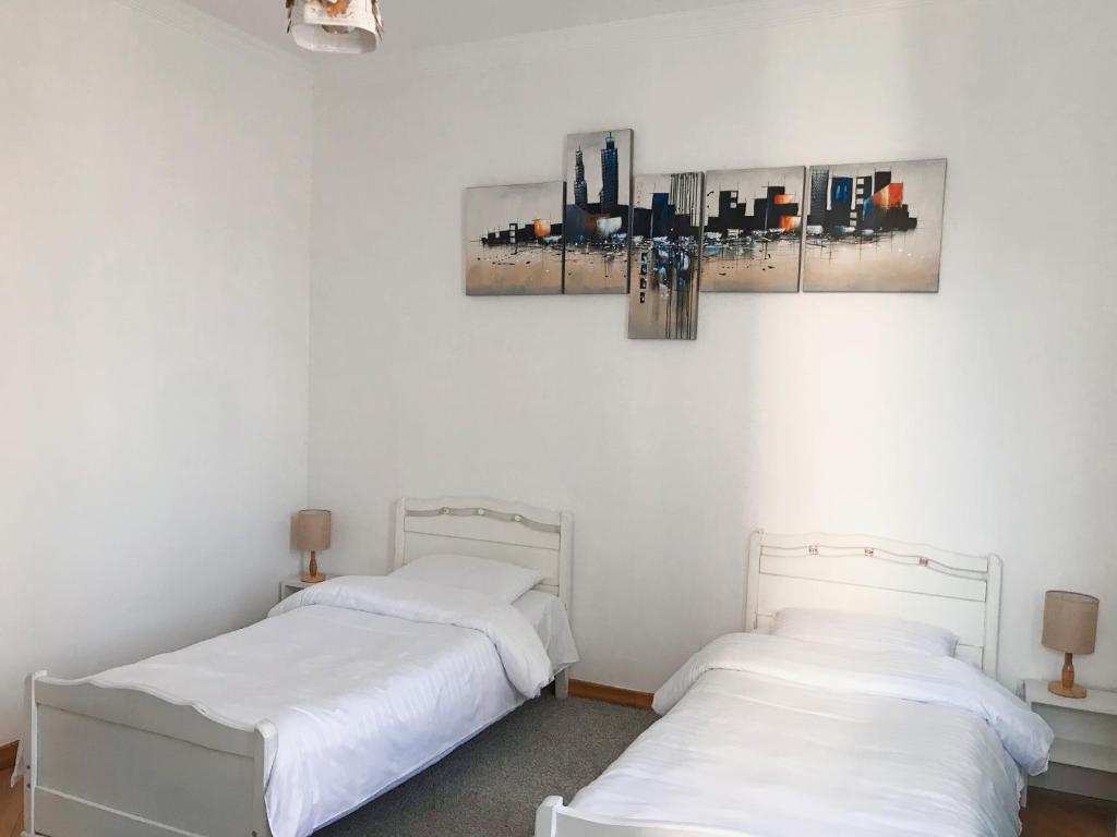 Postel nebo postele na pokoji v ubytování Hotel Gallery