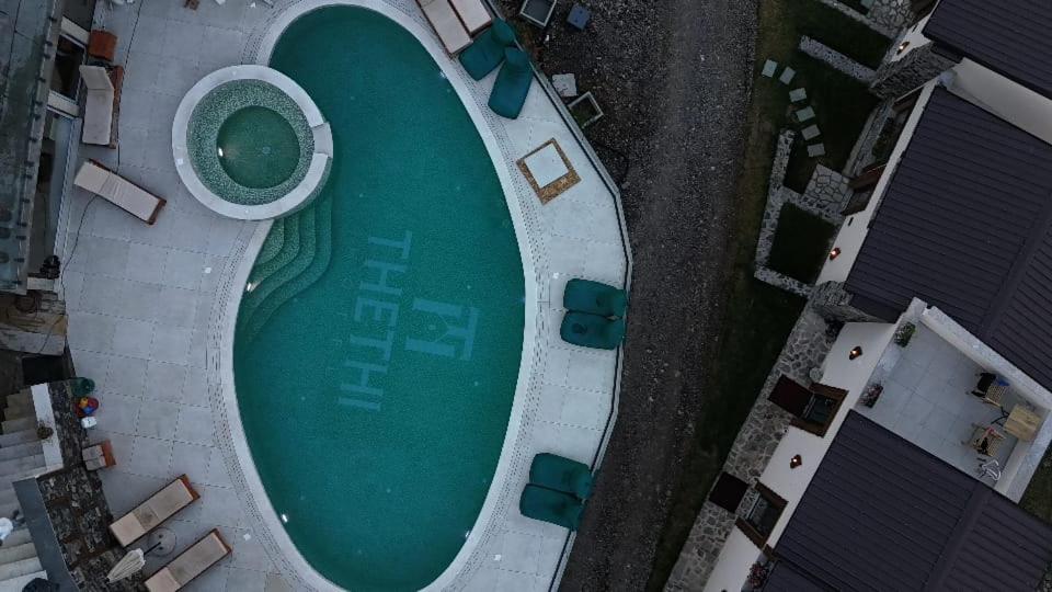 an overhead view of a swimming pool at Hotel Thethi in Theth