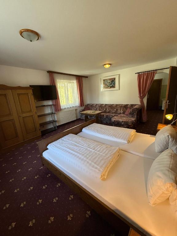 Postel nebo postele na pokoji v ubytování Pension Plattenhof