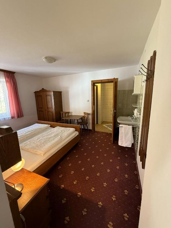 Postel nebo postele na pokoji v ubytování Pension Plattenhof
