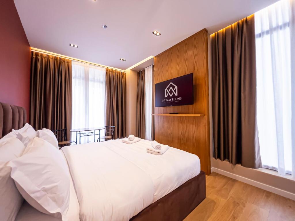 Postel nebo postele na pokoji v ubytování My Way Rooms