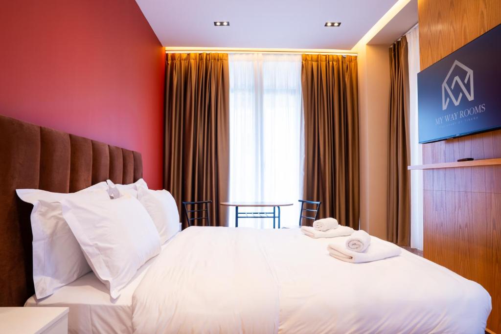 Postel nebo postele na pokoji v ubytování My Way Rooms