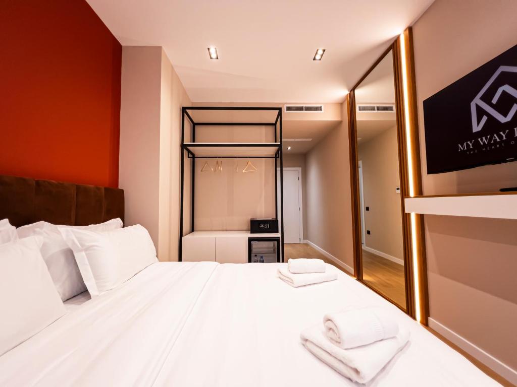 Postel nebo postele na pokoji v ubytování My Way Rooms