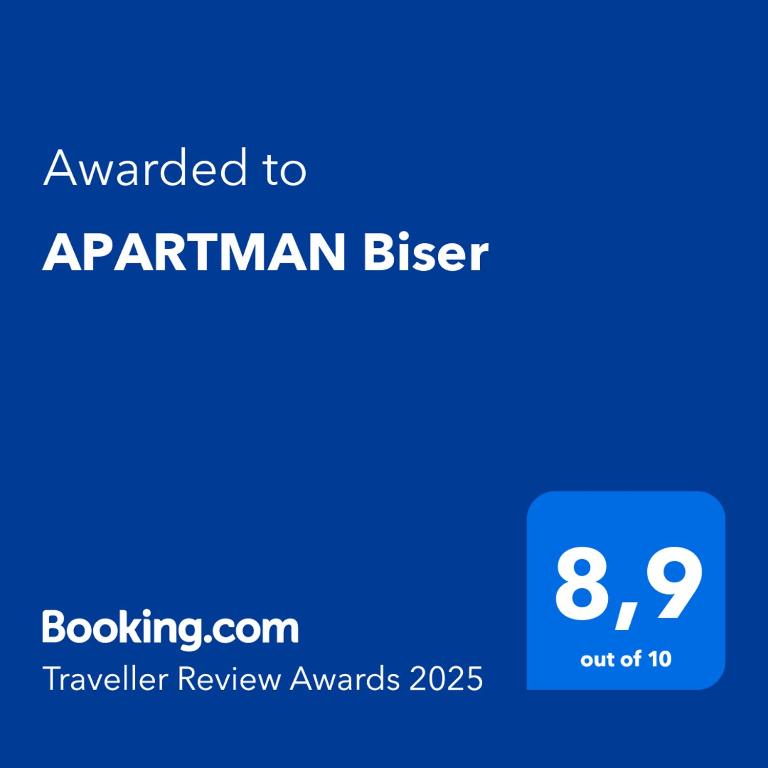 a blue sign with the text awarded to aprilanan biger at APARTMAN Biser in Kotor