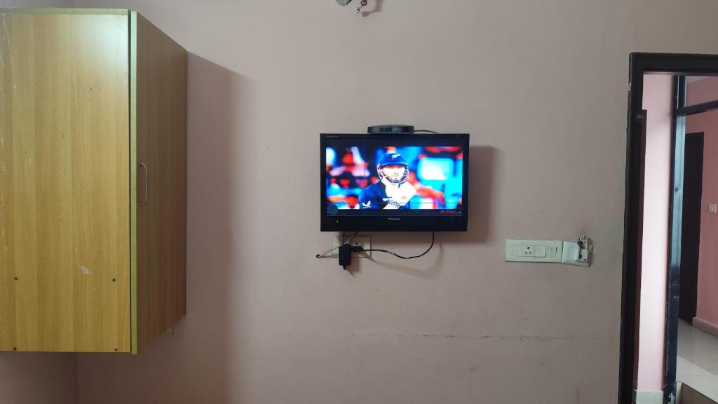 TV a/nebo společenská místnost v ubytování Hotel Tri-Star Regency
