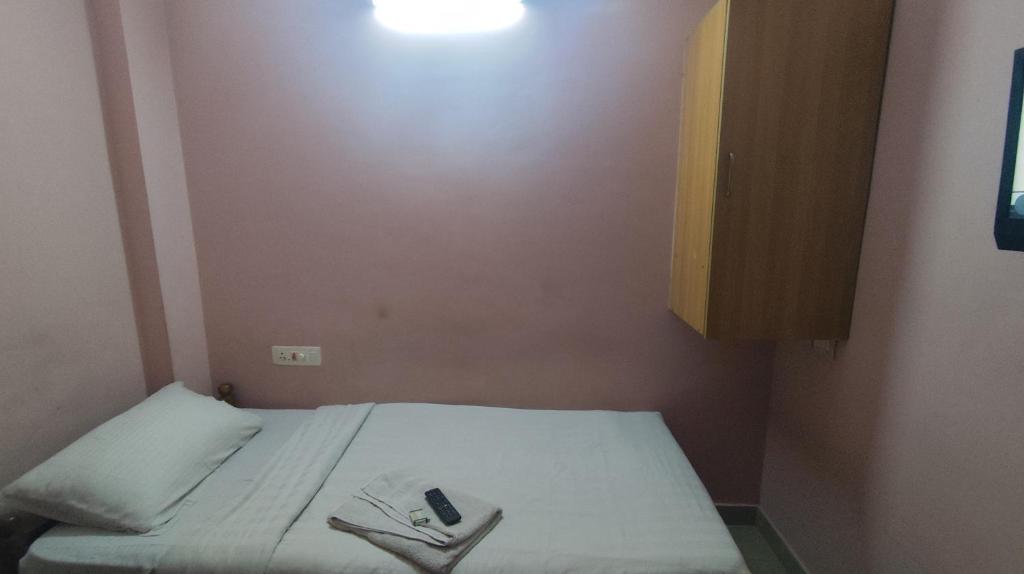 Postel nebo postele na pokoji v ubytování Hotel Tri-Star Regency