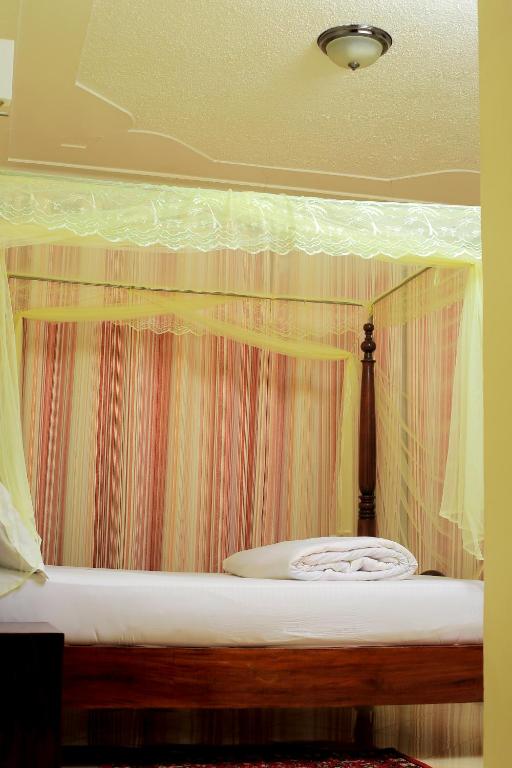 Postel nebo postele na pokoji v ubytování Palace Hotel