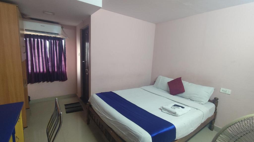 Postel nebo postele na pokoji v ubytování Hotel Tri-Star Regency