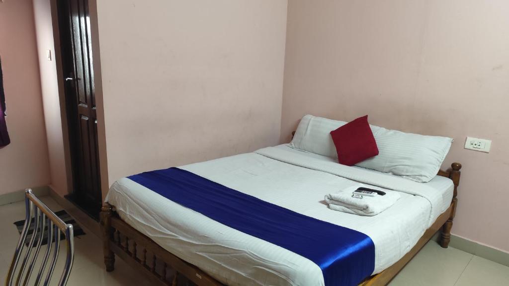 Postel nebo postele na pokoji v ubytování Hotel Tri-Star Regency