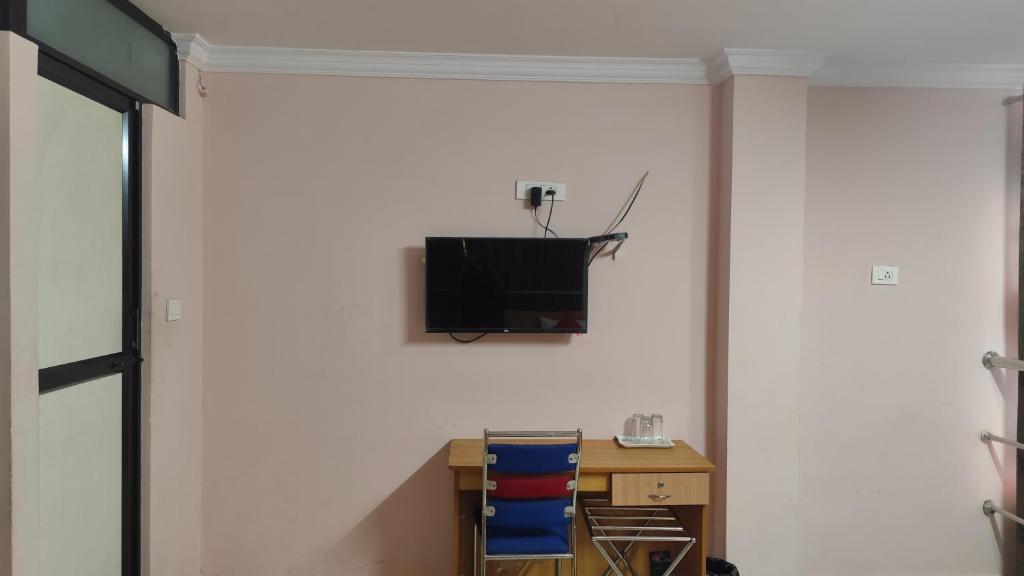 TV a/nebo společenská místnost v ubytování Hotel Tri-Star Regency