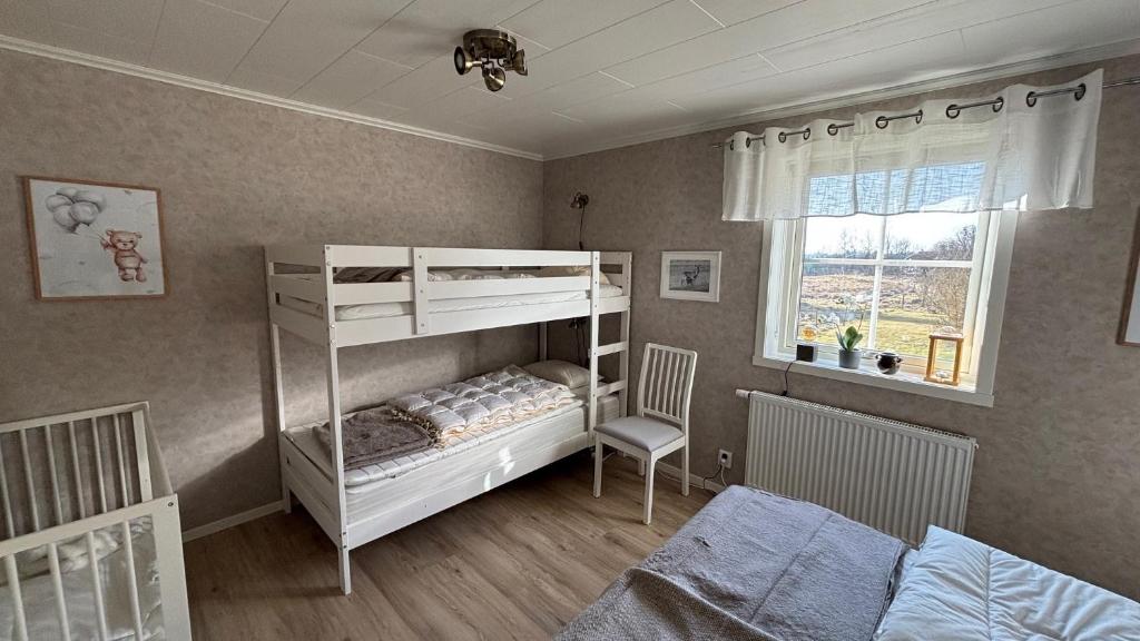 Postel nebo postele na pokoji v ubytování Skog Fegen nära Ullared
