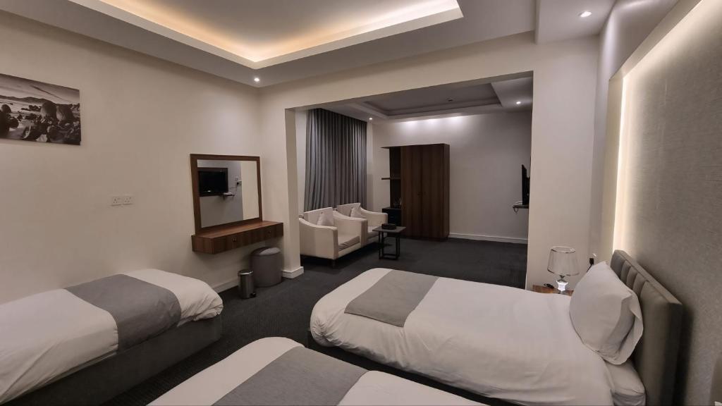 Postel nebo postele na pokoji v ubytování فندق أفين- Avene Hotel
