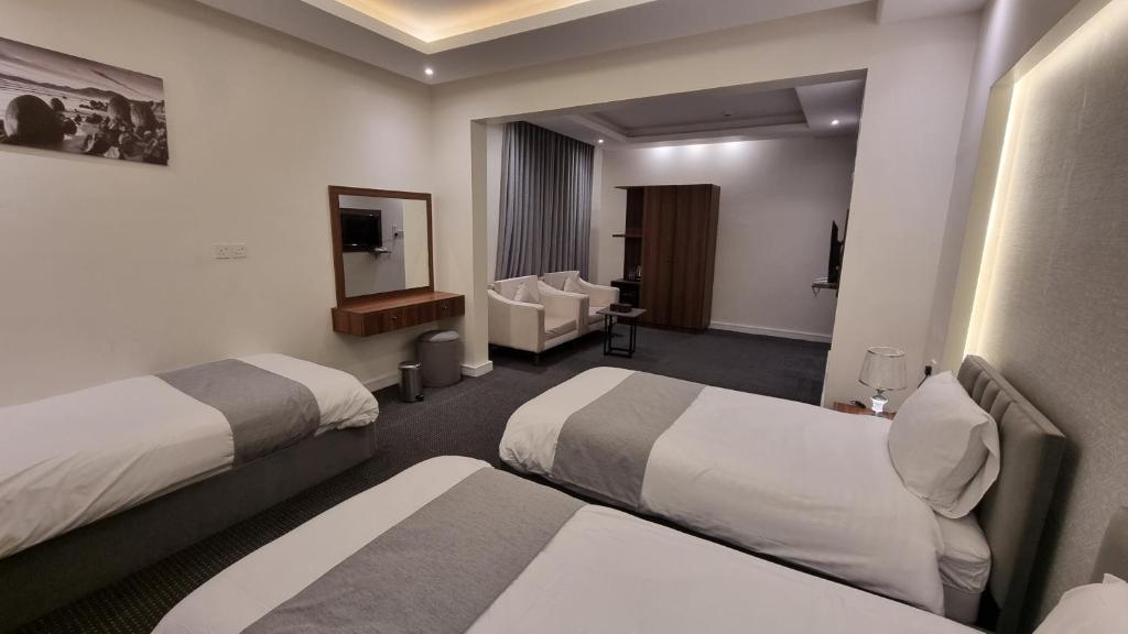 Postel nebo postele na pokoji v ubytování فندق أفين- Avene Hotel