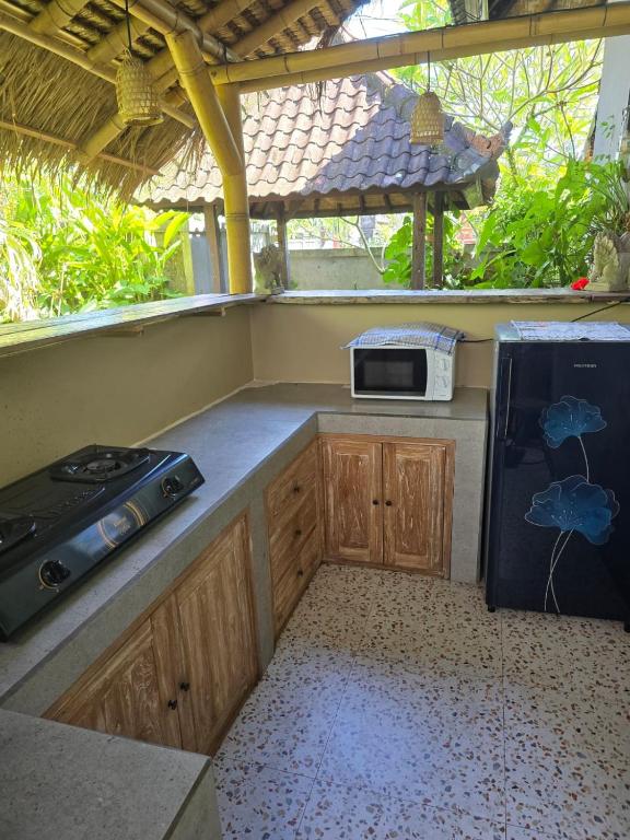 Kuchyň nebo kuchyňský kout v ubytování Aura Guesthouse