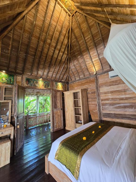 Postel nebo postele na pokoji v ubytování Aura Guesthouse